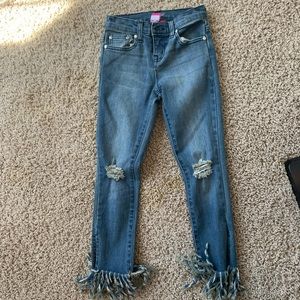 kids Pinc medium wash jeans with frayed bottoms